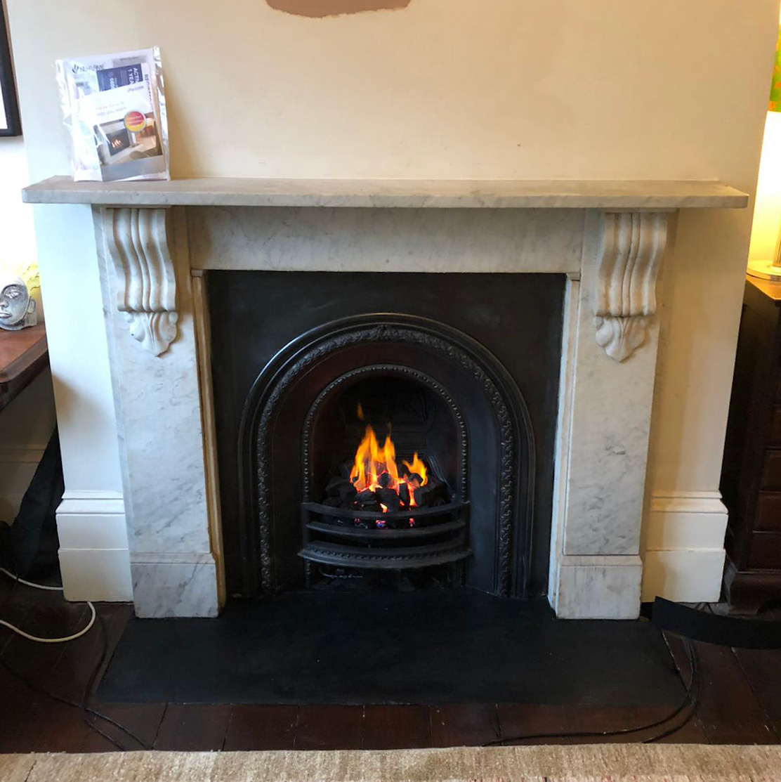 Carrara marble "Corbel" mantel, original arch insert, gas fire